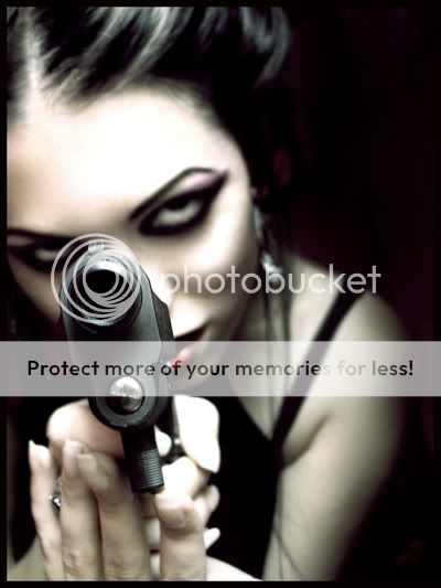 http://i470.photobucket.com/albums/rr61/ginakaos999/With_gun_loaded_by_fantasmica.jpg